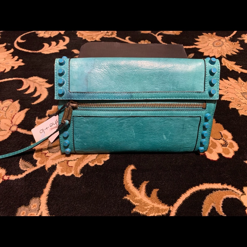 She + Lo studded teal clutch